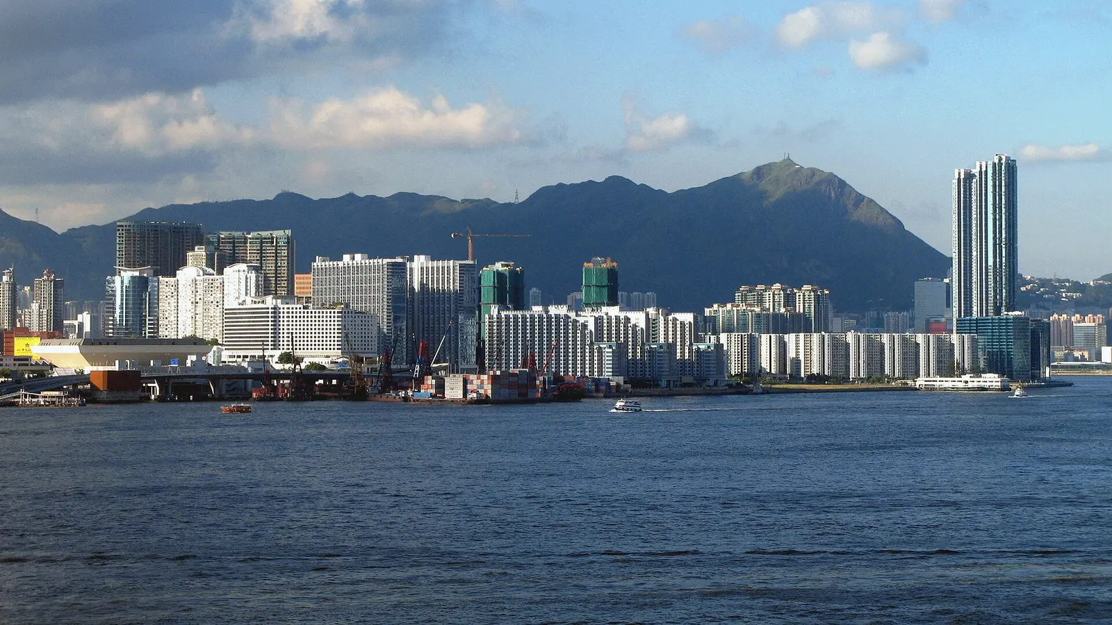 Hung Hom waterfront with the harbour and hills behind