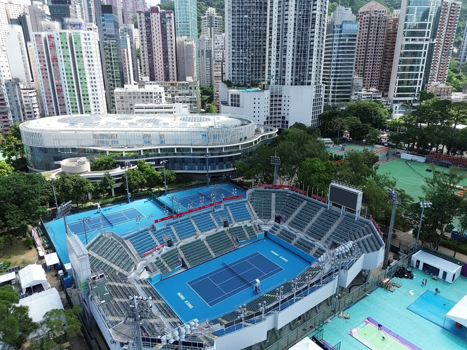 Aerial view of the tennis stadium and courts at Victoria Park in Causeway Bay
